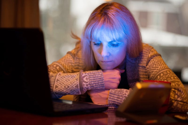 Woman with a light box stock photo.