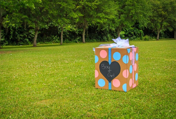 Box of balloons at gender reveal
