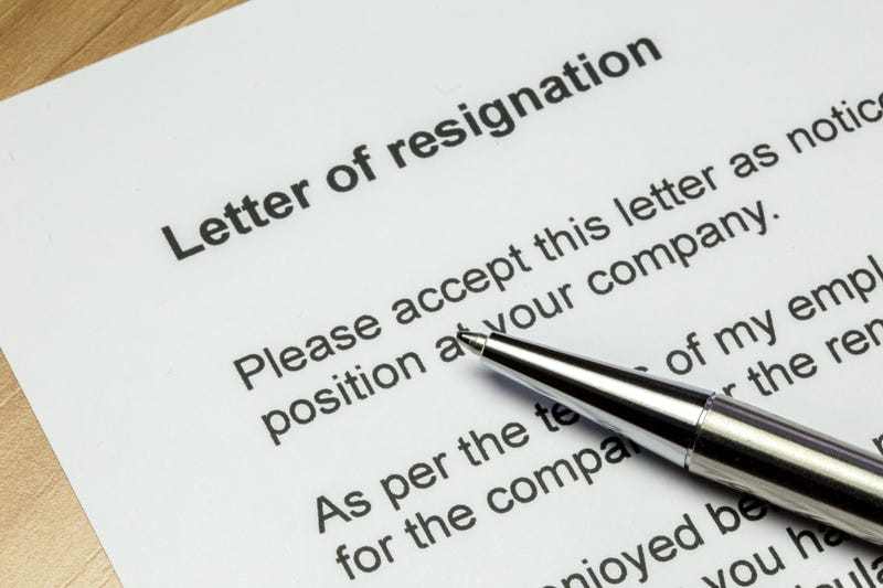 Letter of resignation closeup with silver pen
