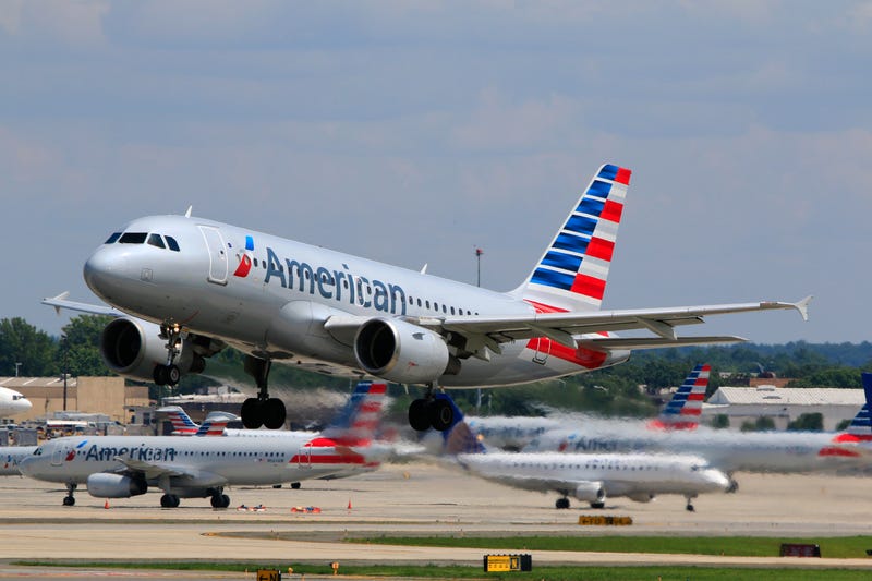 American Airlines plane takes off from runway
