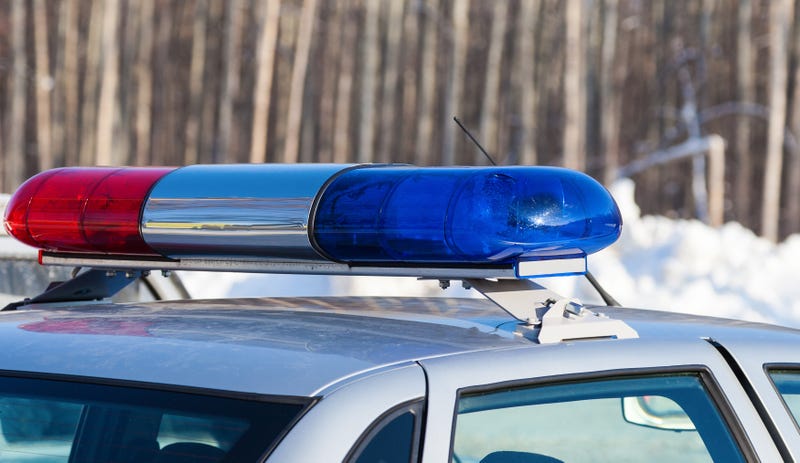 Close-up of the colorful lights on top of police squad car
