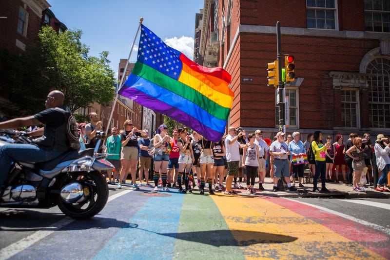 Participants and parade-goers at a Philly Pride Parade.