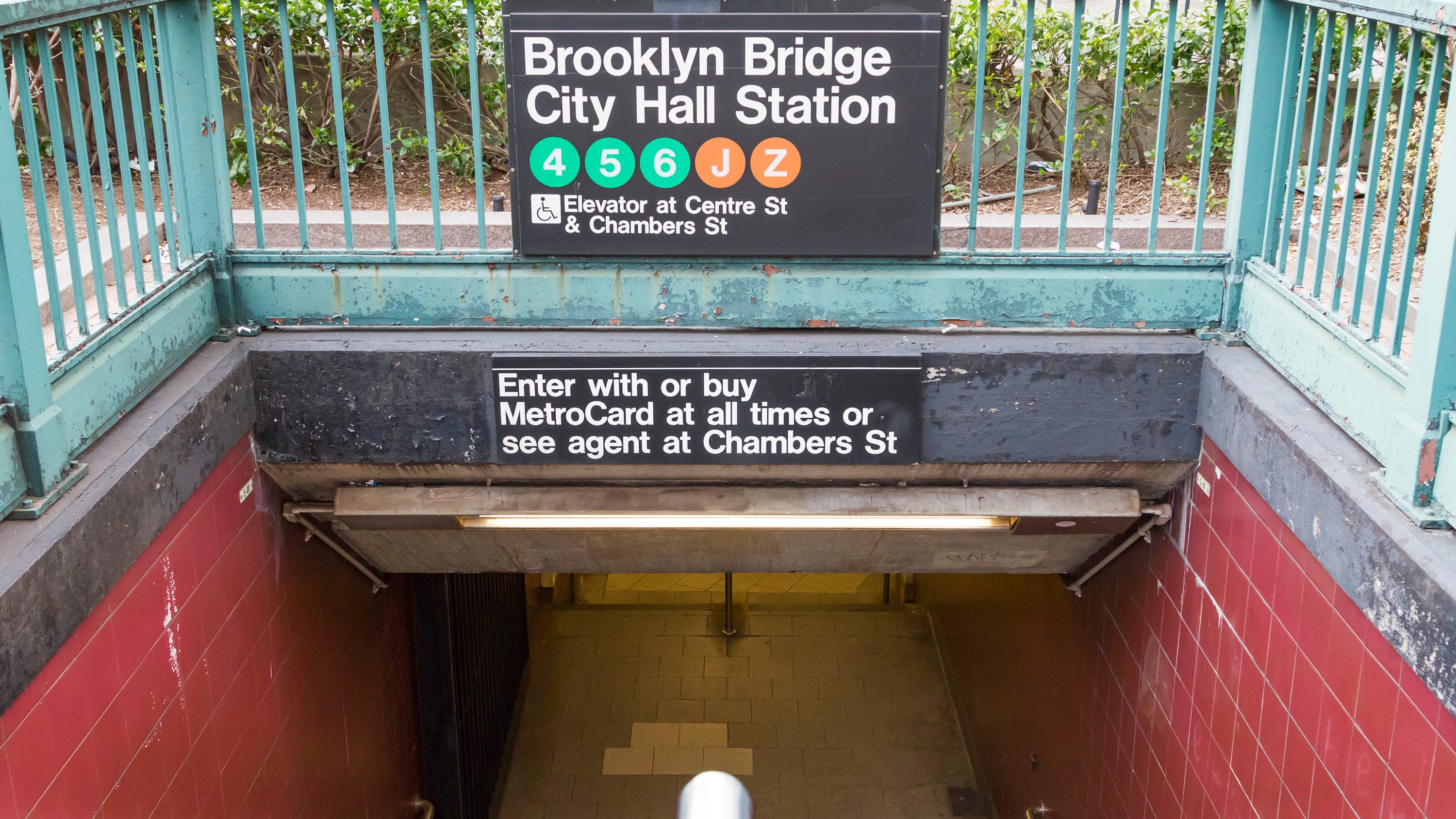 Man punches woman down stairs, tries to remove her leggings at City Hall subway station