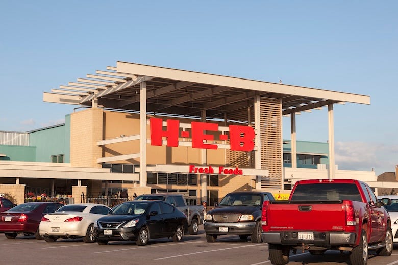 Cars parked outside of an H-E-B