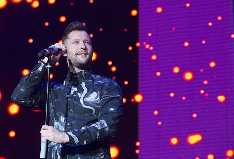 Calum Scott performs on stage as part of the Girl Guiding Big Gig 2016 at SSE Arena Wembley on July 2, 2016 in London, United Kingdom