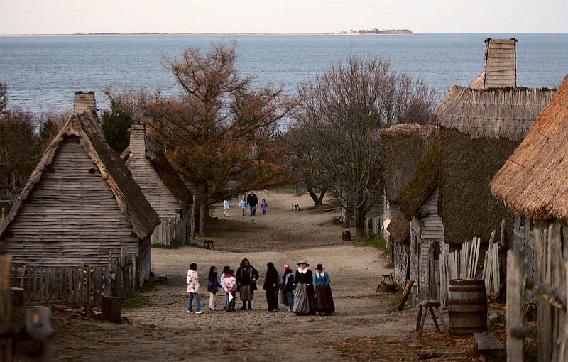 People visit the 1627 Pilgrim Village at Plimoth Patuxet Museums, where role-players portray Pilgrims seven years after the arrival of the Mayflower.