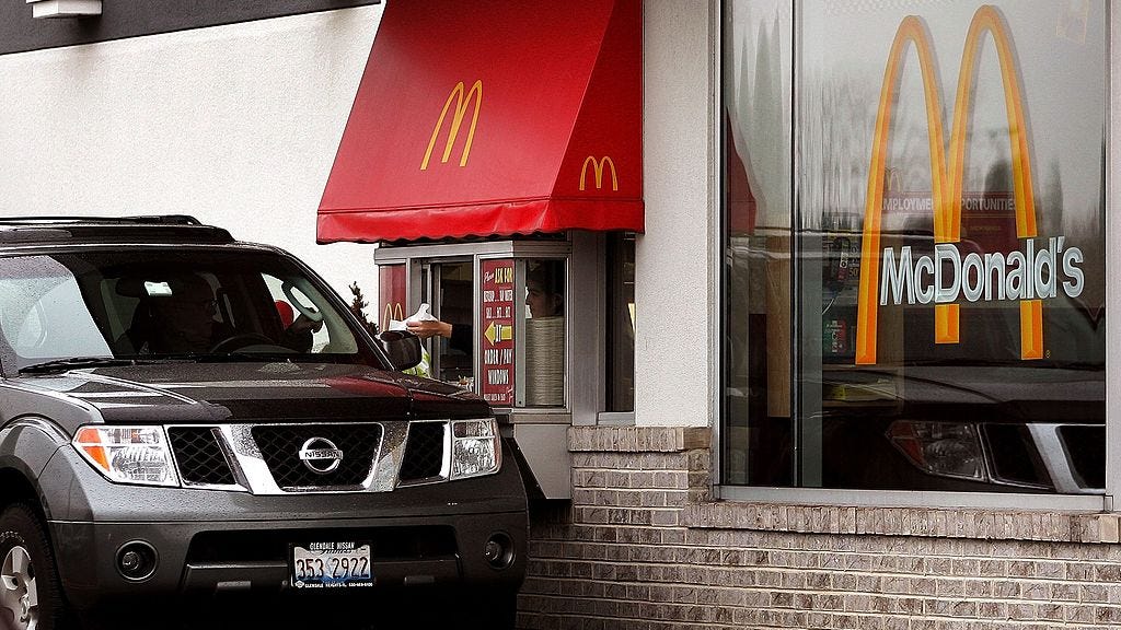 McDonald's worker jumps through drive-thru window to save choking customer