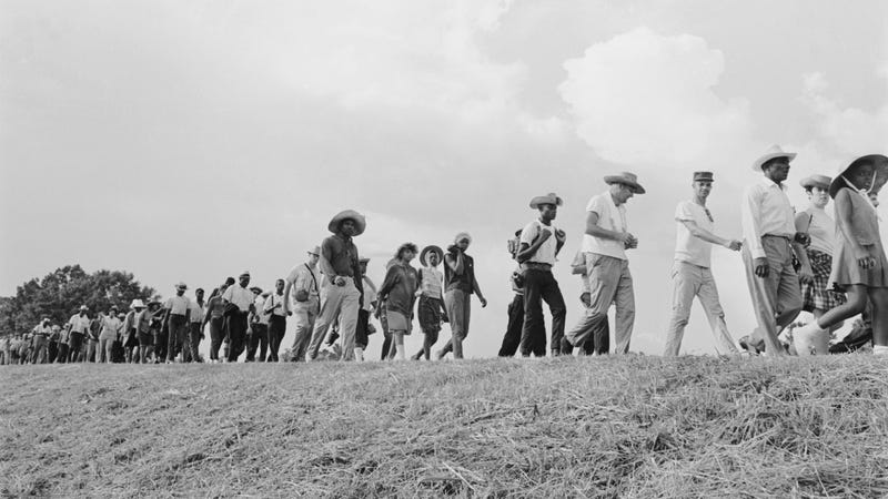 Participants on the Meredith Mississippi March near the town of Canton, June 1966. The march began with civil rights campaigner James Meredith setting out to walk from Memphis, Tennessee to Jackson, Mississippi, in order to encourage African-Americans along the way to register and vote. After Meredith was shot and wounded, other civil rights campaigners continued the march in his name.