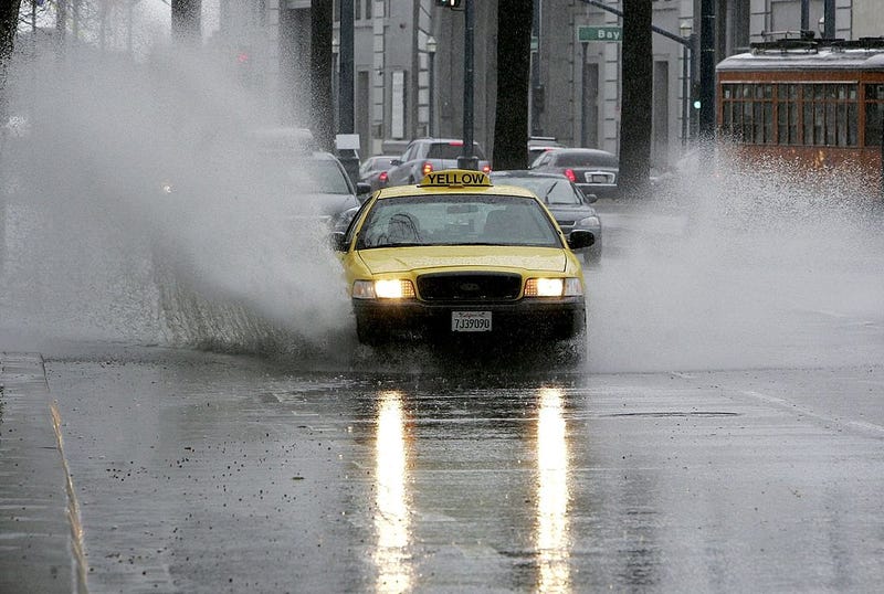 A taxicab drives through standing water March 31, 2006 in San Francisco, California. 