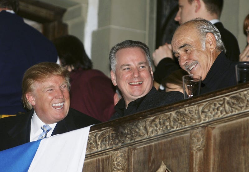Donald Trump, First Minister of Scotland Jack McConnell and Sean Connery talk at the Johnnie Walker Dressed to Kilt fashion show at St John Divine Cathedral on April 3, 2006 in New York City.