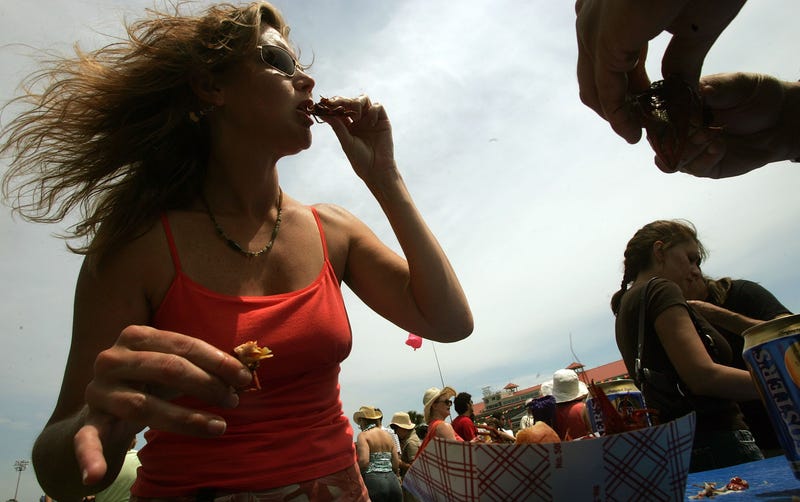 woman eating crawfish