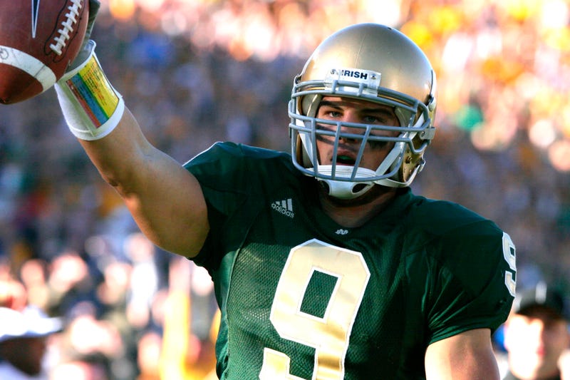 Tom Zbikowski (9) celebrates