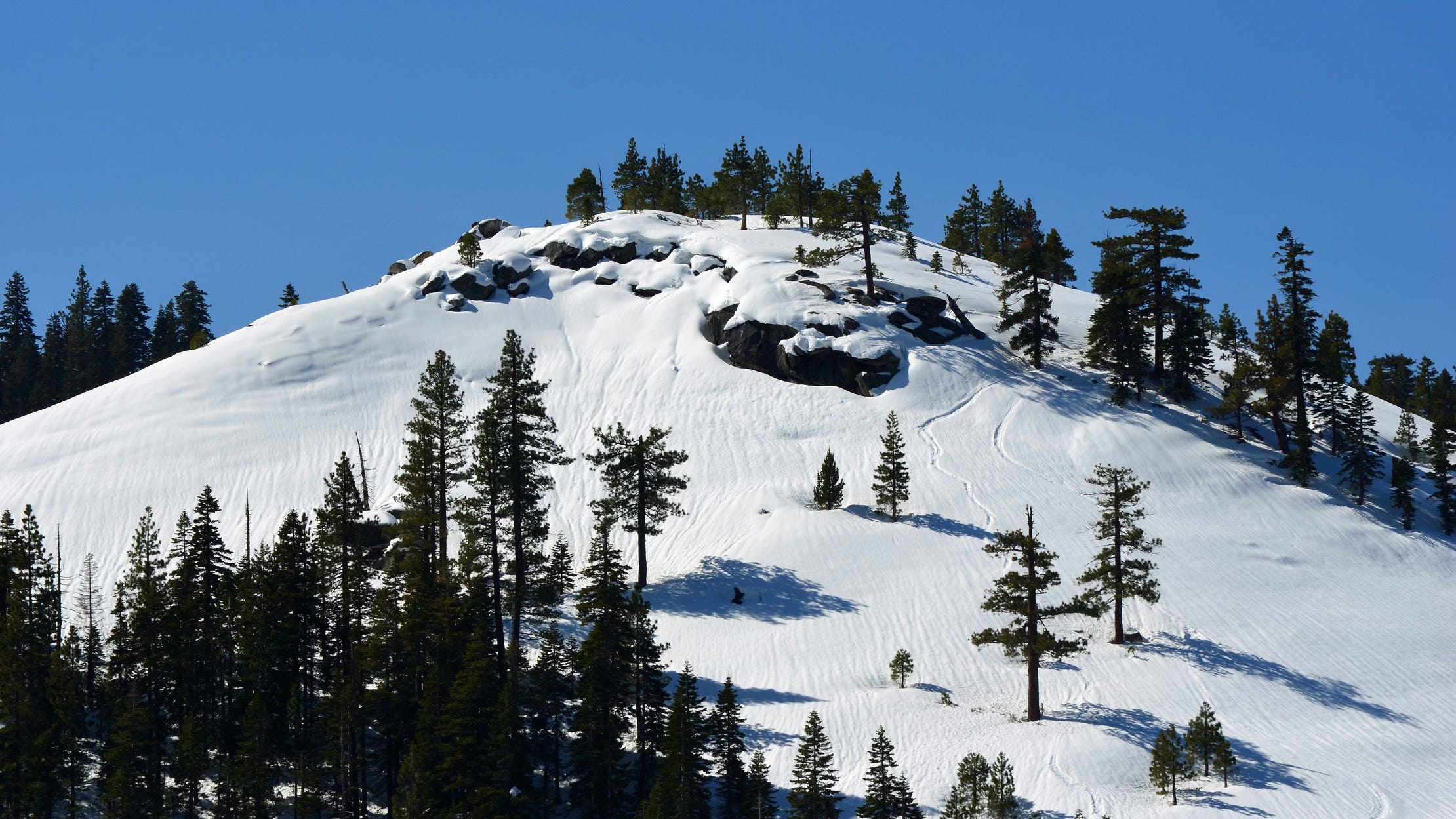 Lake Tahoe ski resorts open early this year amidst cold temperatures, snowfall