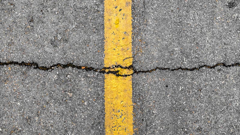 Crack on line yellow on road textured
