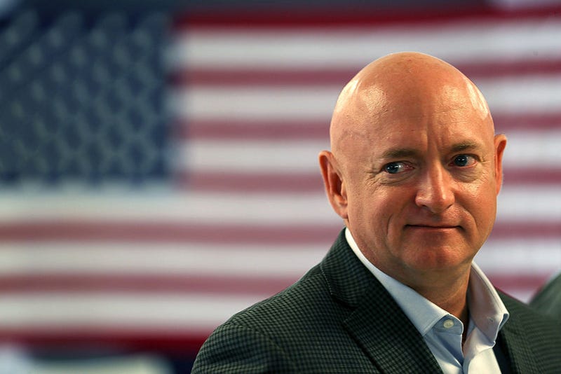 Retired NASA astronaut Mark Kelly waits to speak during a press conference where he joined his wife, former Rep. Gabrielle Giffords, and other anti-gun violence activists and victims' families to discuss the impact of gun violence