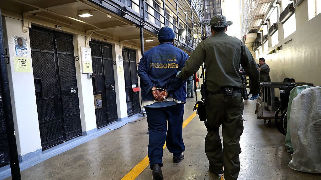 San Quentin guard charged for allegedly smuggling phones to inmates