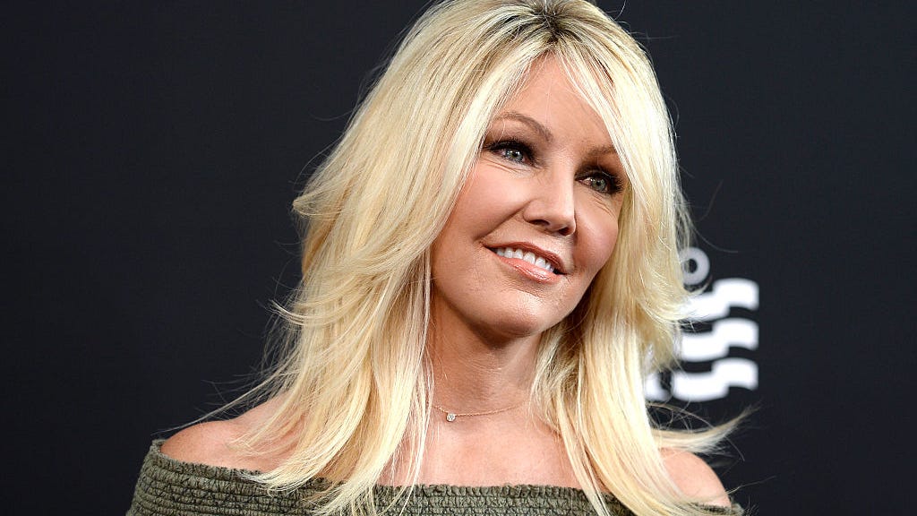 Heather Locklear is engaged to boyfriend Chris Heisser