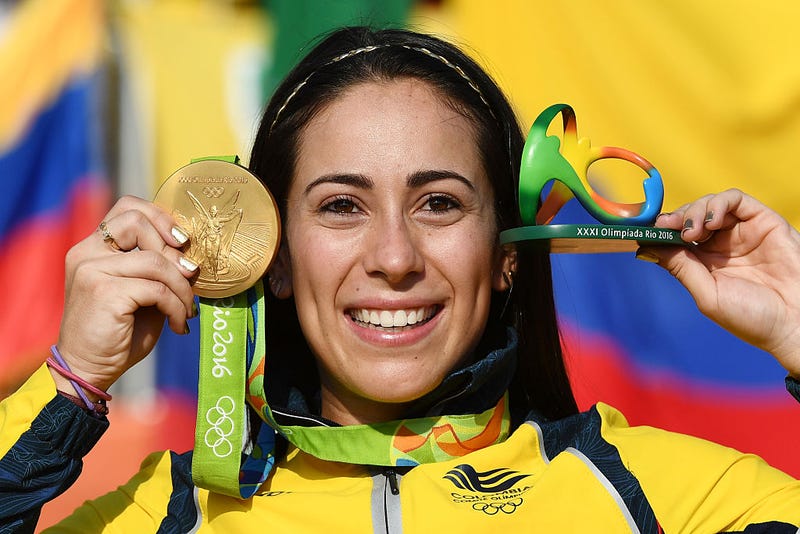 Mariana Pajon of Colombia celebrates with the gold after winning the Women's BMX Final on day 14 of the Rio 2016 Olympic Games
