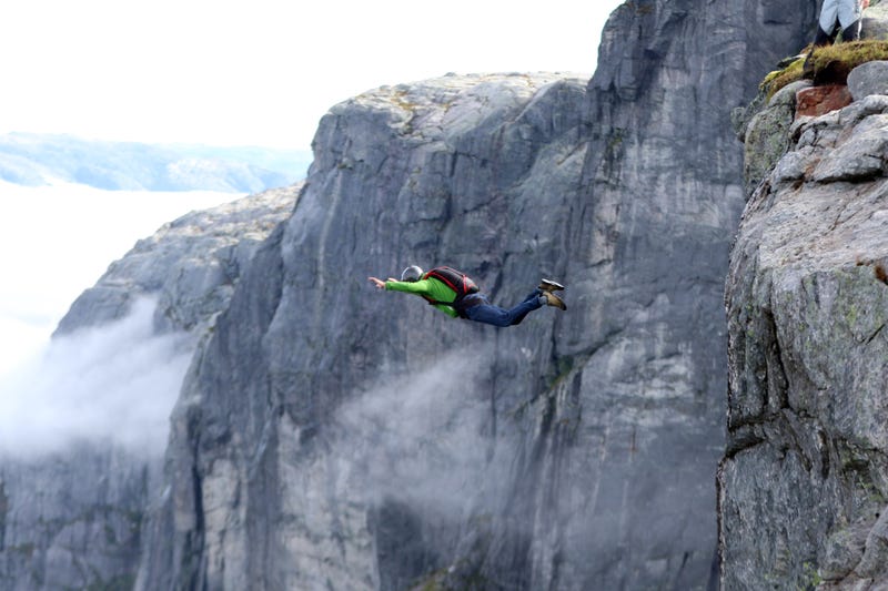A BASE jumper in Norway takes the leap