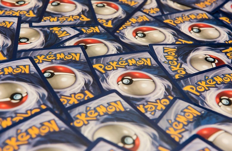 Pokémon trading cards spread out