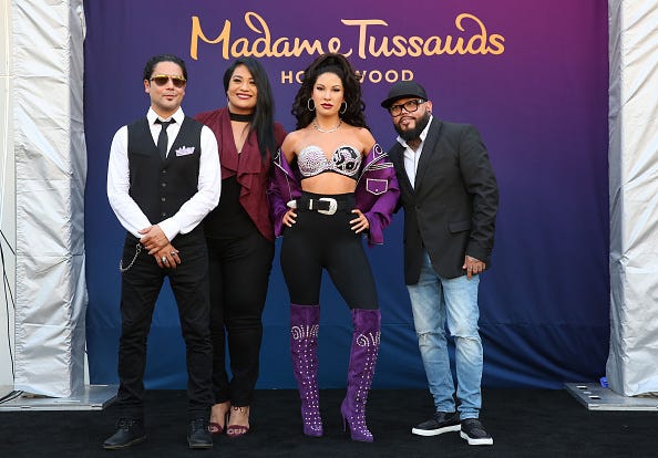 Selena Quintanilla's Wax figure next to her family