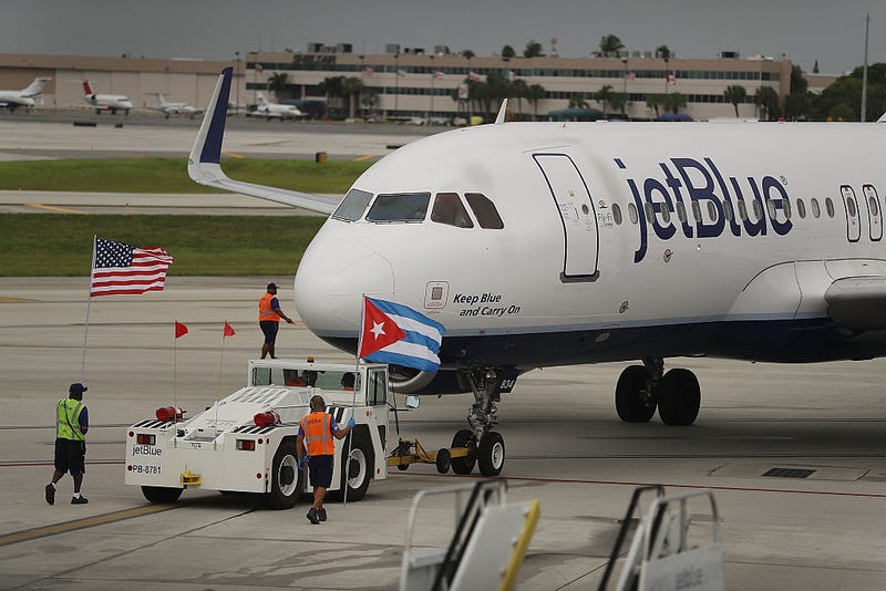 A JetBlue flight was delayed on Monday after a woman allegedly made a false bomb threat.