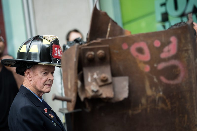 Bob Beckwith stands next to a piece of steel from the World Trade Center on Sept. 6, 2016