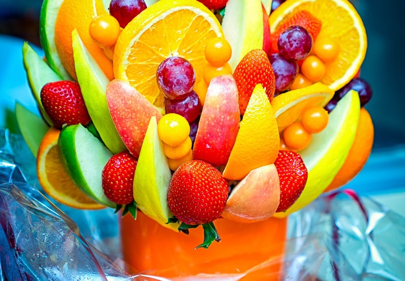 An Edible Arraignments delivery man had just finished dropping off a fruit bouquet on Saginaw's east side when deputies say he came under gunfire and was chased while driving on I-675 on Wednesday.