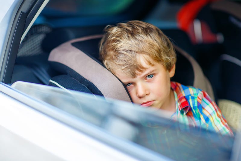 Boy left alone in vehicle