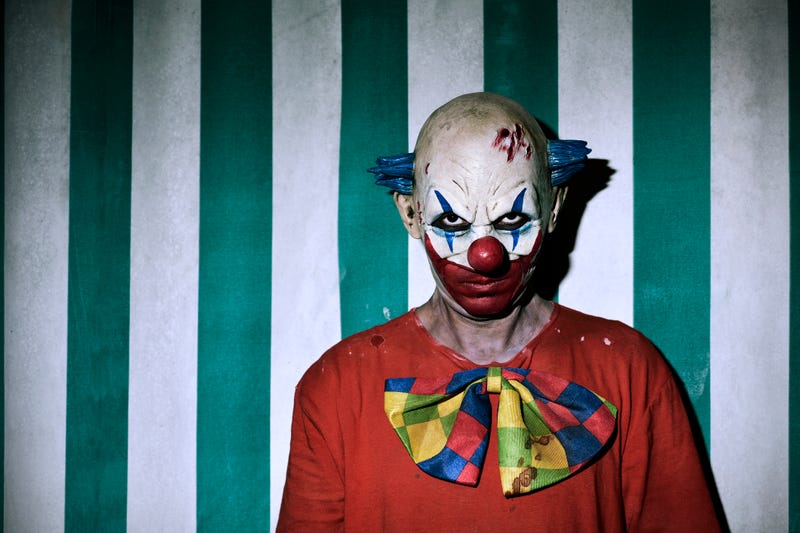 Scary clown in haunted house