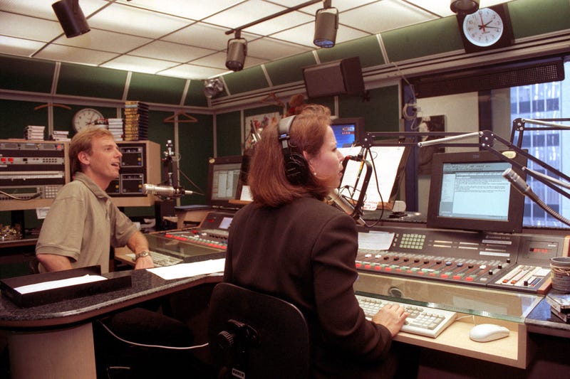 Wayne Cabot (L) and Deborah Rodriguez (R) broadcast their last show in the old WCBS Radio studios on October 20, 2000, prior to relocating in a new digital studio