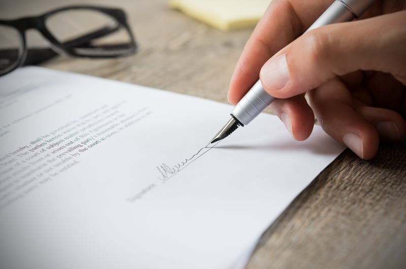 Person signing a document