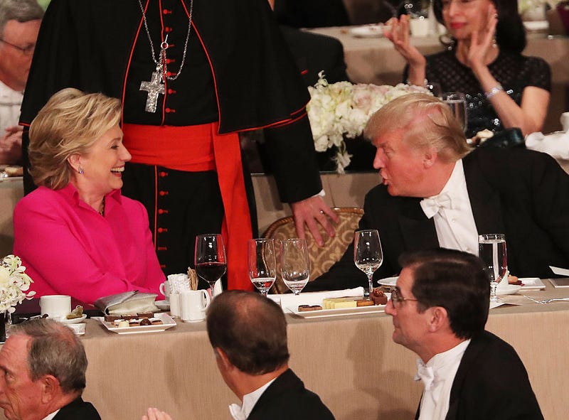 Hillary Clinton speaks briefly with Donald Trump while attending the annual Alfred E. Smith Memorial Foundation Dinner at the Waldorf Astoria on October 20, 2016 in New York City.The white-tie dinner, which benefits Catholic charities and celebrates former Governor of New York Al Smith, has been attended by presidential candidates since 1960 and gives the candidates an opportunity to poke fun at themselves and each other. (Photo by Spencer Platt/Getty Images)