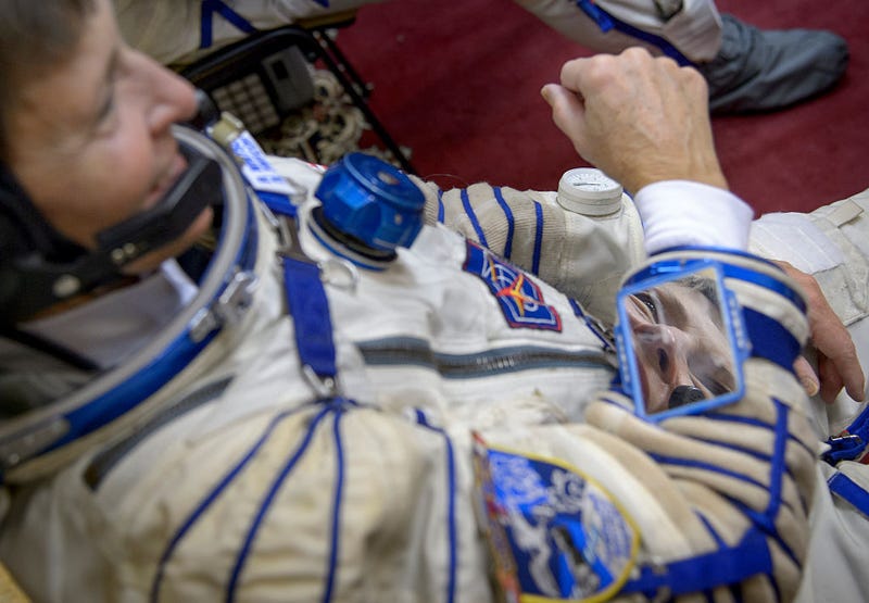 In this handout provided by NASA, Expedition 50 NASA astronaut Peggy Whitson is seen after donning her Sokol suit ahead of her final qualification exams with fellow crew mates Russian cosmonaut Oleg Novitskiy of Roscosmos and ESA astronaut Thomas Pesquet, on October 25, 2016 at the Gagarin Cosmonaut Training Center (GCTC) in Star City, Russia. (Photo by Bill Ingalls/NASA via Getty Images)