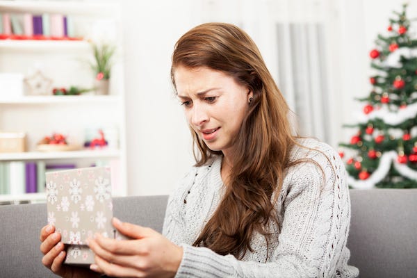 Woman unhappy with her Christmas gift