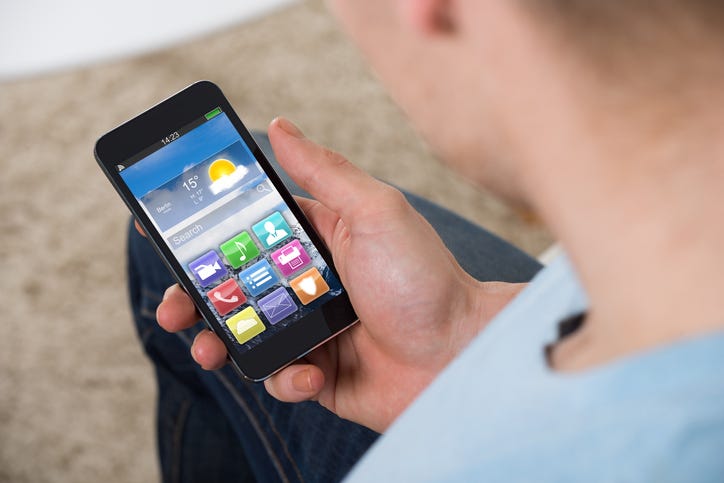 Man Checking Weather On His Phone