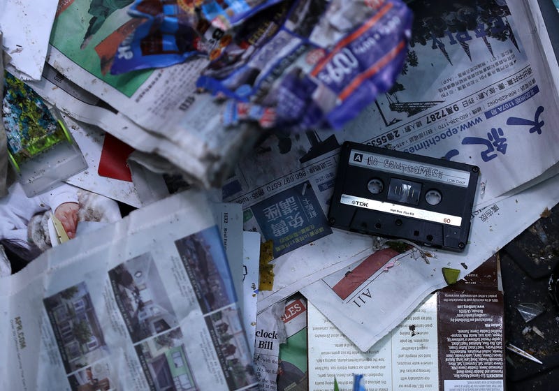 A cassette tape sits on a conveyor belt that is carrying recyclable materials through a sorting machine at Recology's Recycle Central on November 16, 2016 in San Francisco, California.
