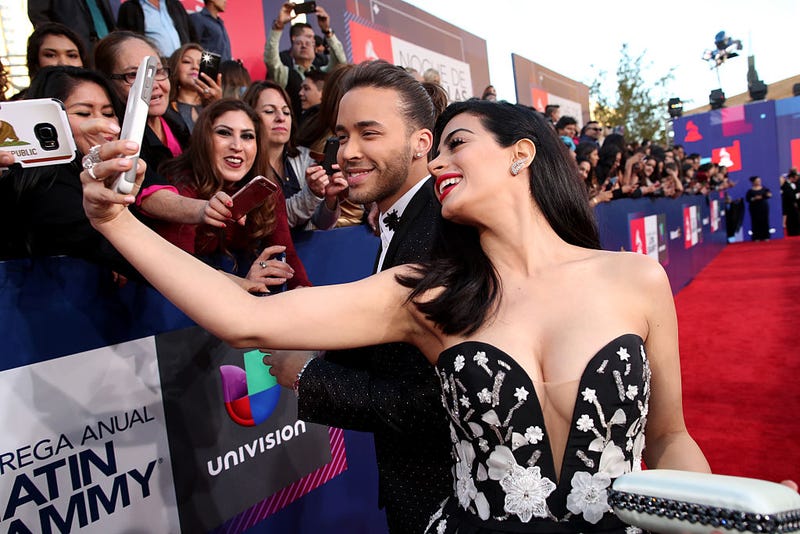 Recording artist Prince Royce (L) and actress Emeraude Toubia