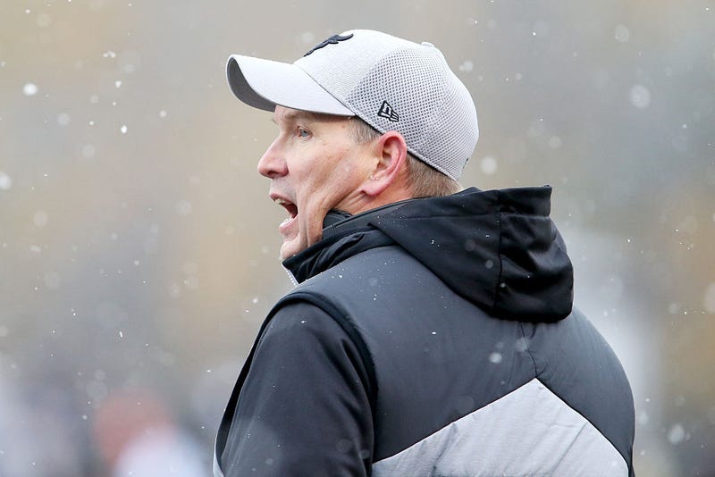 A new head football coach in Lawrence