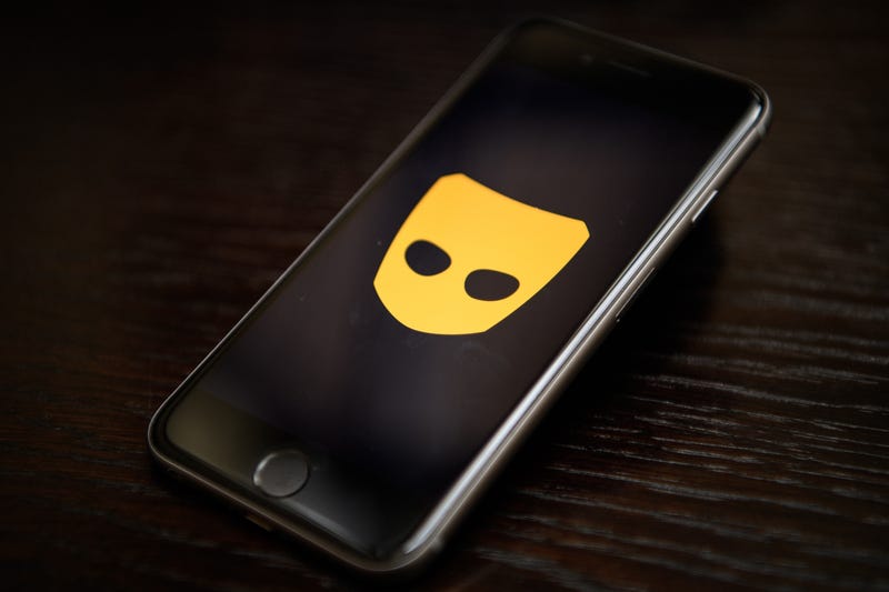  The "Grindr" app logo is seen on a mobile phone screen on November 24, 2016 in London, England.