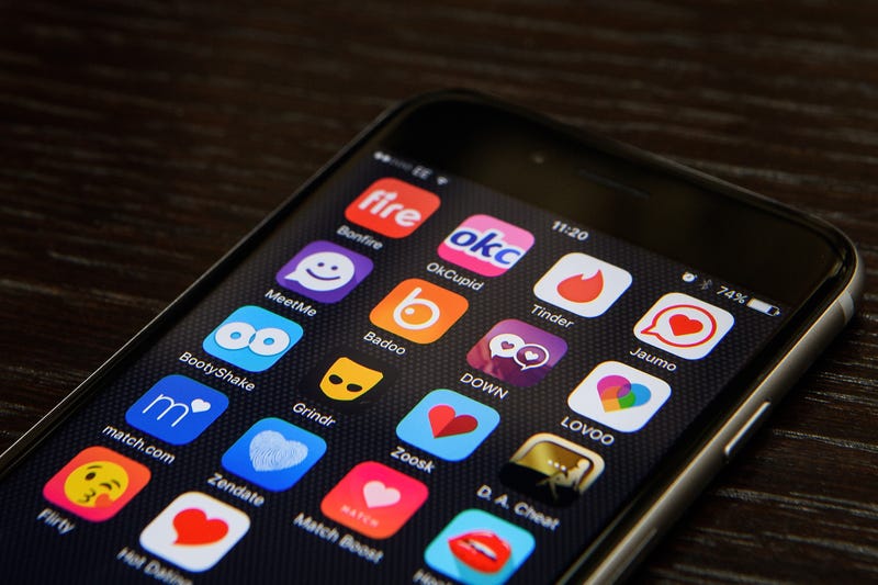 phone displaying dating apps