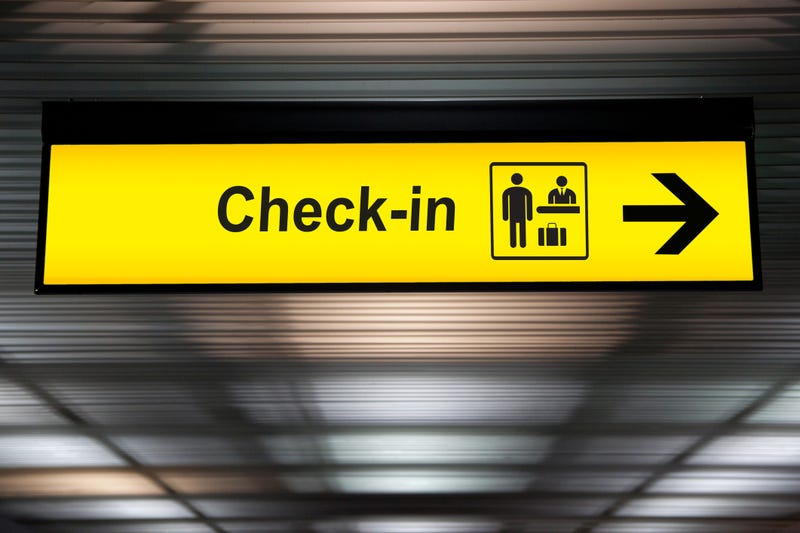 Airport check-in sign. 