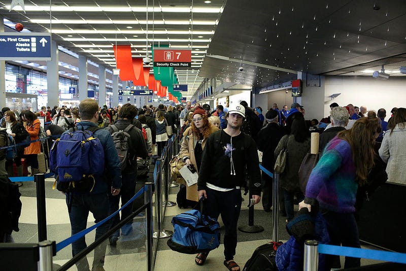 Travelers wait in the TSA security line at O'Hare International Airport on December 23, 2016 in Chicago, Illinois. O'hare International Airport is one of the busiest hubs in the nation during the weeks surrounding Christmas and New Years.
