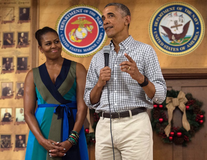 Then-President Barack Obama addresses troops with Then-First Lady Michelle Obama at Marine Corps Base Hawaii in Kailua on December 25, 2016