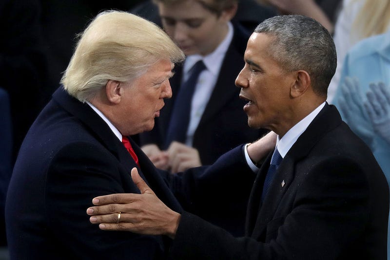 Former U.S. President Barack Obama (R) congratulates U.S. President Donald Trump after he took the oath of office on the West Front of the U.S. Capitol on January 20, 2017 in Washington, DC. 