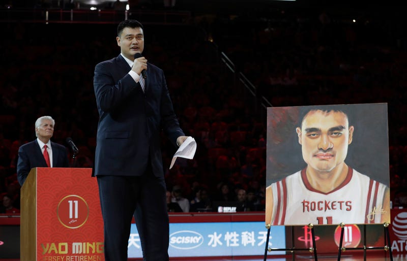 yao ming at his houston rockets jersey retirement ceremony