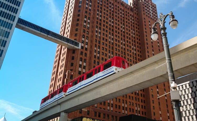 Detroit People Mover train between the Guardian Building and One Woodward i