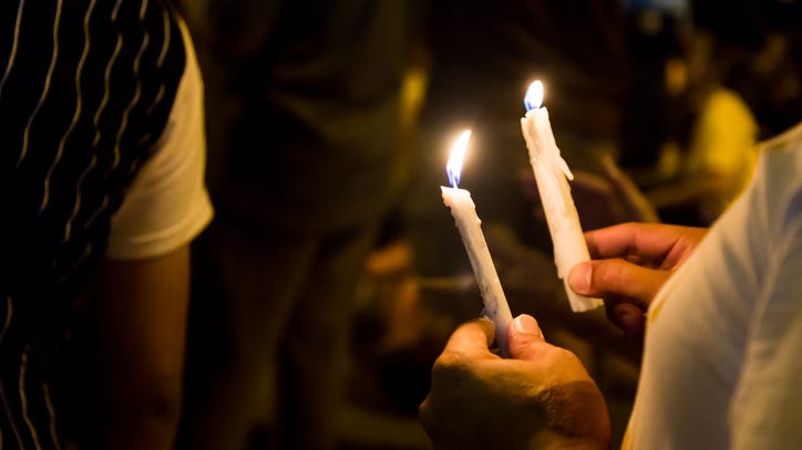 Vigil held for teenage Arlington brothers gunned down last week