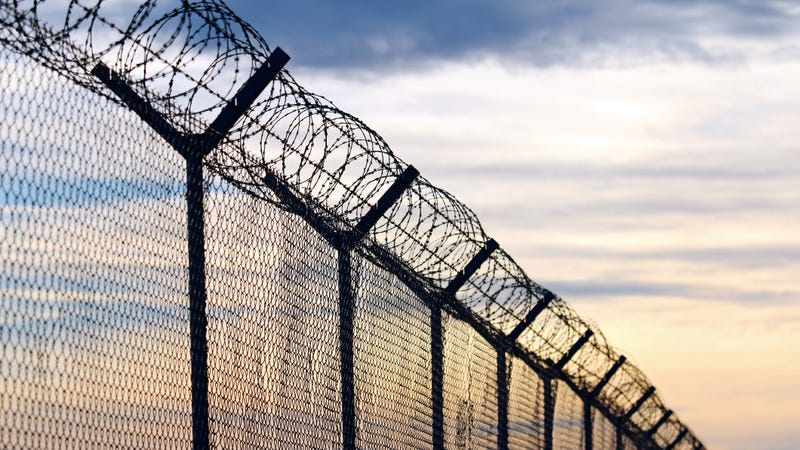 Barbed wire outside a prison.