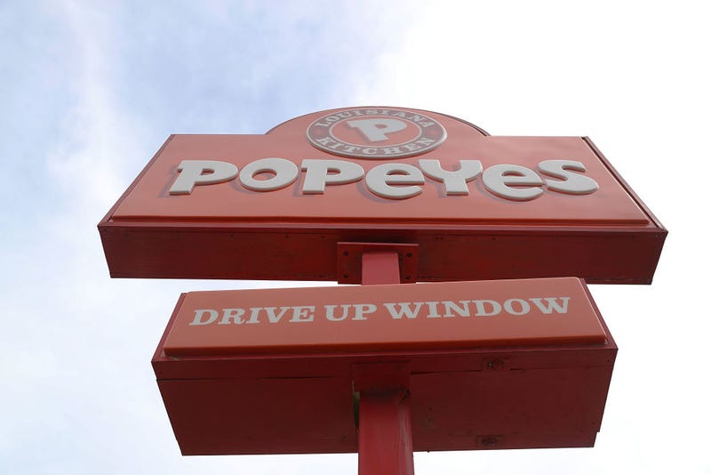 A Popeyes restaurant sign is seen on February 21, 2017 in Miami, Florida. Burger King and Tim Horton's owner Restaurant Brands International has announced plans on buying Popeyes Louisiana Kitchen in a deal valued at $1.8 billion. (Photo by Joe Raedle/Getty Images)